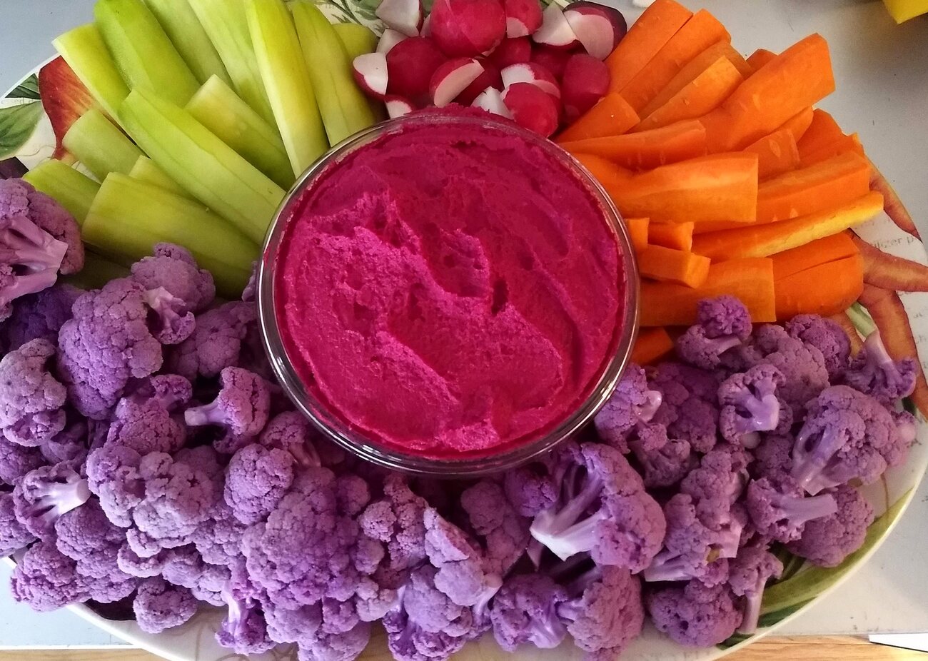 Beet hummus with purple cauliflower